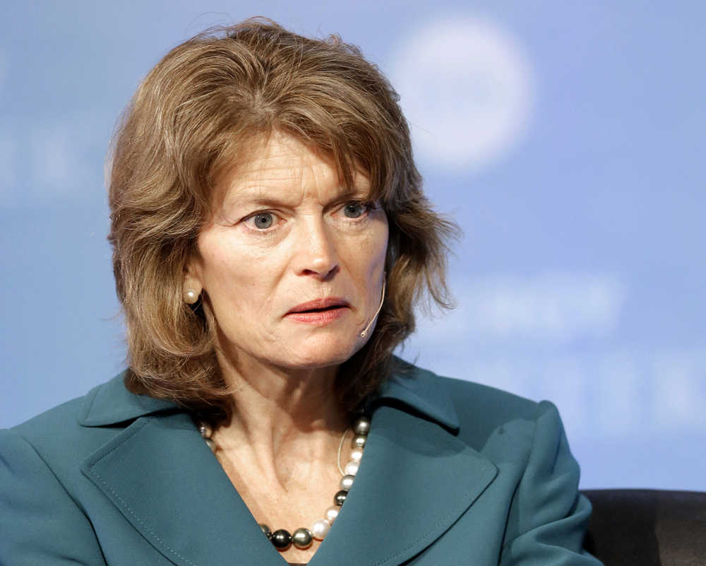 FILE - In this March 3, 2014 file photo, Sen. Lisa Murkowski, R-Alaska speaks in Houston. The committee has voted to approve Dr. Robert Califf to be commissioner of the Food and Drug Administration, but the nomination may face trouble on the Senate floor. Murkowski said she will hold up the nomination until she has reassurances from FDA that genetically modified salmon will be labeled as such. (AP Photo/Pat Sullivan, File)