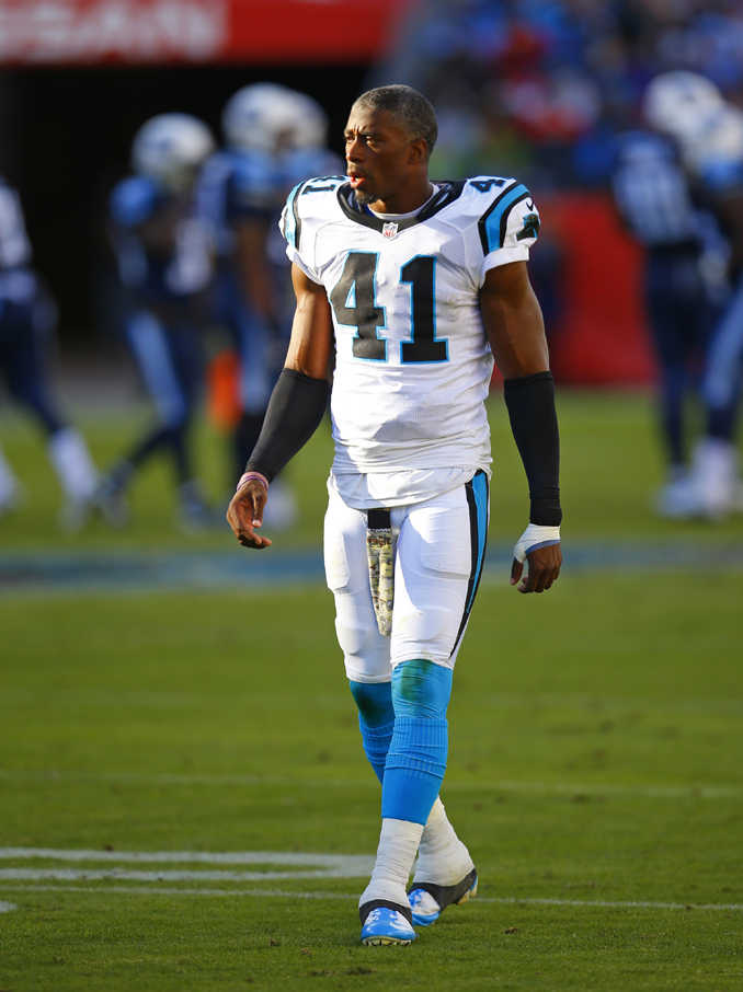 This Nov. 15, 2015 photo shows Carolina Panthers safety Roman Harper walking the field during a game against the Tennessee Titans in Nashville, Tenn.