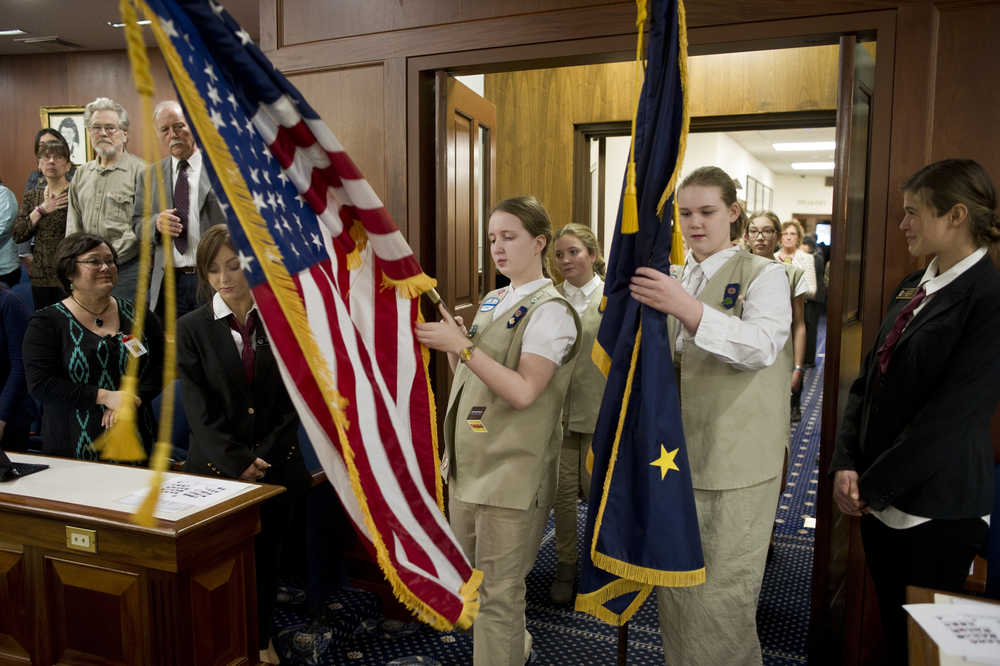 Members of the Girl Scouts of Alaska's Juneau Service Unit Honor Guard carry the colors into the House chambers on the first day of the 29th Legislature at the Capitol in Juneau on Tuesday, Jan. 19, 2016.