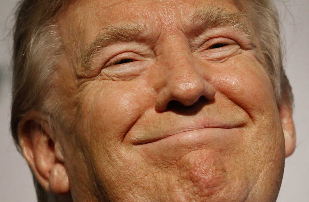 In this Jan. 19,, 2016, photo, Republican presidential candidate Donald Trump smiles after speaking at the Iowa Renewable Fuels Summit in Altoona, Iowa. Trump and some mainstream Republicans are engaged in a long-distance flirtation. Both sides are coming to the realization that they'll need each other if the billionaire businessman becomes the party's presidential nominee. (AP Photo/Patrick Semansky)