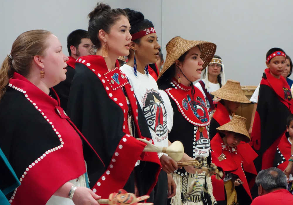 Former All Nations Children dancers joined the children's dance group in celebration of its 20th anniversary on Saturday at the Tlingit and Haida Community Center. Barbara Dude, fourth from left, has taken over leadership of the group, replacing founder and longtime leader Vicki Soboleff, looking on from the background. Also shown, from left,  are Ruby Soboleff, Madeline Soboleff Levy and Miciana Hutcherson. 