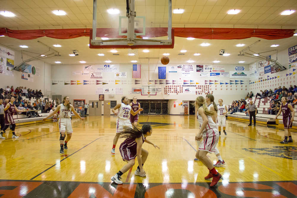 The Crimson Bears' Tona Fogg knows she is in the perfect spot to catch the ball and make a basket.