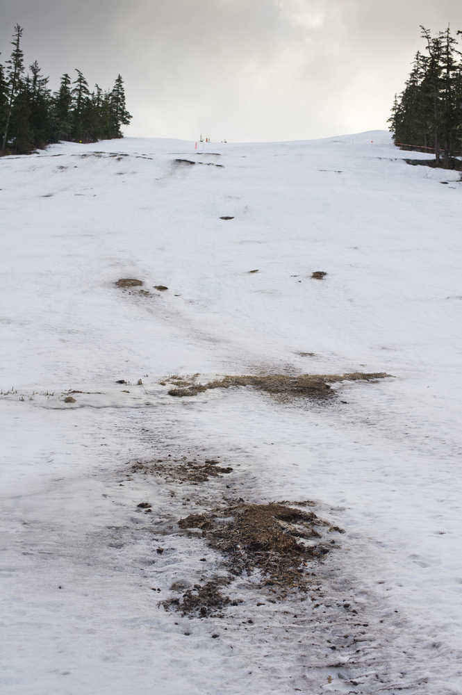 Little snow and recent rains have left minimal snow coverage on the lower part of the Eaglecrest Ski Area on Monday.