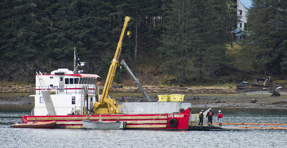Global Diving and Salvage has started work Tuesday to remove the 96-foot tugboat Challenger that sank in Gastineau Channel in September.