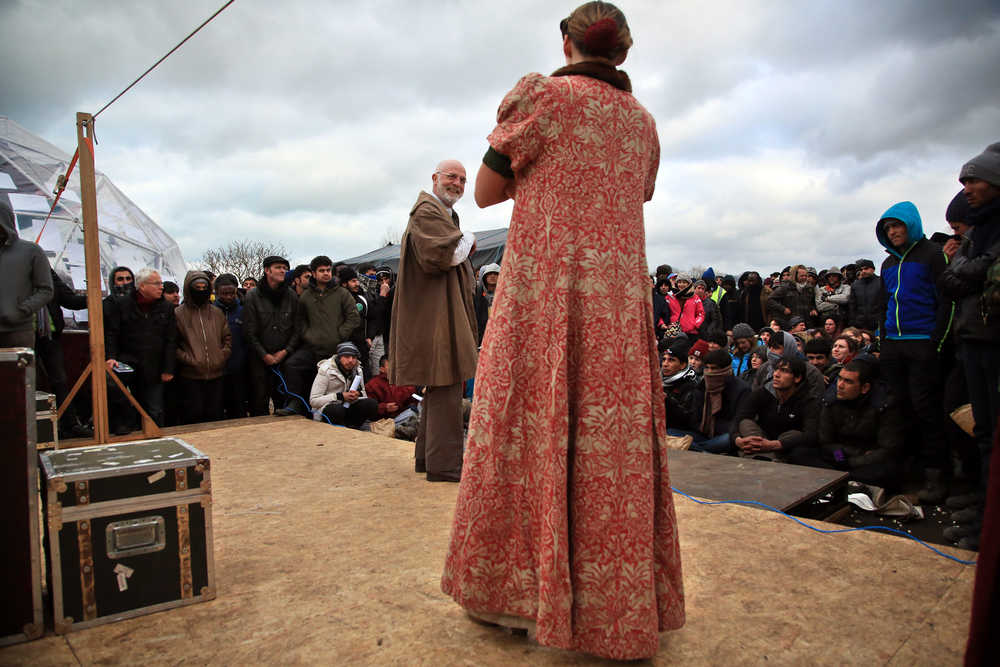 Actors perform Hamlet on Wednesday at the refugee camp in Calais, northern France.