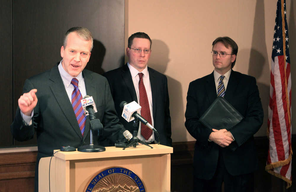 U.S. Sen. Dan Sullivan, Alaska Attorney General Craig Richards and John Skidmore, director of the Law Department criminal division, speak at a news conference announcing the state will pursue prosecution of Anchorage businessman Bill Allen on Friday in Anchorage. Allen was a key witness in the trial of the late U.S. Sen. Ted Stevens. Richards says revised federal law requires the U.S. Department of Justice, if requested, to either allow state prosecution of Allen on allegations of sexual abuse or reveal a reason why it can't, such as a plea deal made with federal prosecutors.