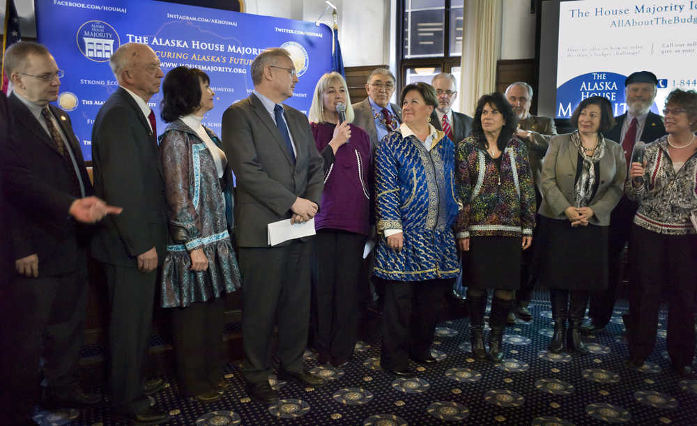 Rep. Cathy Muñoz, R-Juneau, center, speaks during a press conference at the Capitol on Friday by House Majority members as they announce an Idea Line that the public can call to leave a message with ideas to solve the state's budget problem.