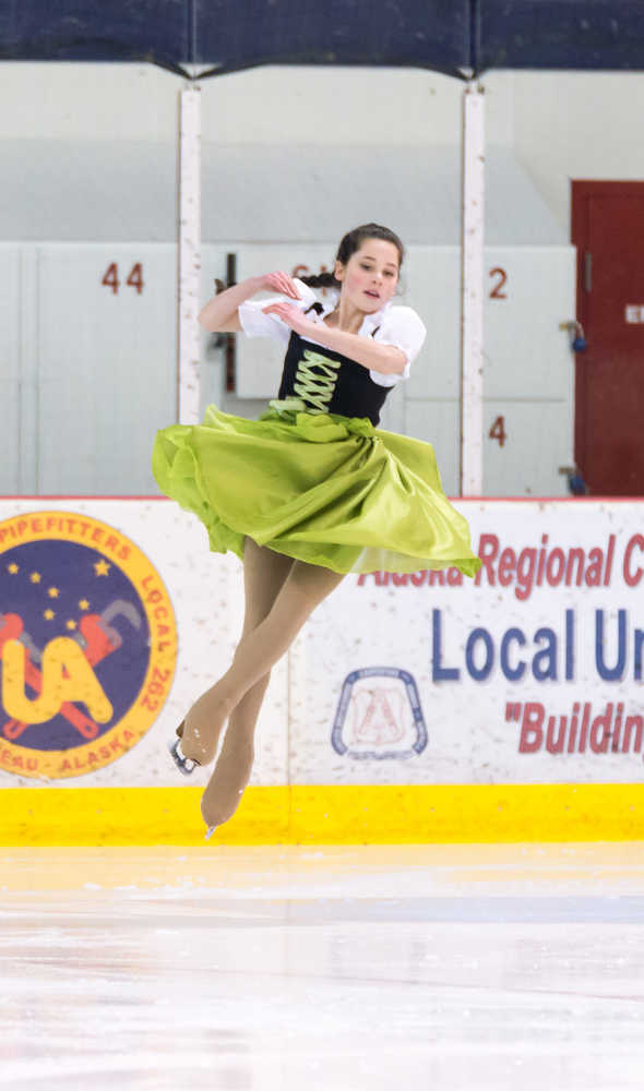 A skater performs at the Juneau Skating Club's 11th Annual Basic Skills competition on Sunday.