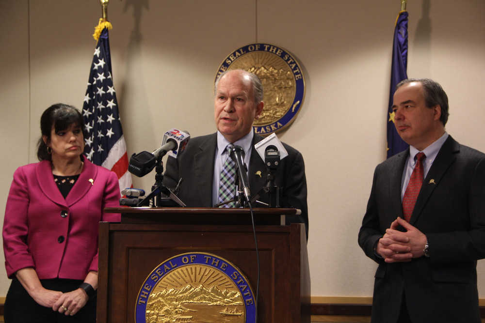 LEFBP (Exploration) Alaska President Janet Weiss, left, Gov. Bill Walker, center, and ConocoPhillips Alaska President Joe Marushack discuss the progress of the Alaska LNG Project at a press conference in Anchorage on Wednesday. The four partners committed to continue work on the project through the rest of the year, but are weighing options on how to proceed as depressed oil prices have hammered the bottom lines for North Slope producers and the state budget.