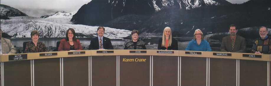 An official City and Borough of Juneau photo used in a campaign mailer by mayoral candidate Karen Crane has come under scrutiny by current and former Assembly members.