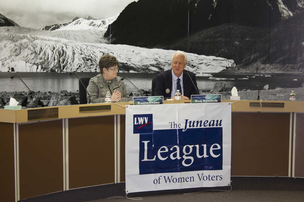 Mayoral candidates Karen Crane, left, and Ken Koelsch are shown during a forum held at the Assembly Chambers on Wednesday night, sponsored by the League of Women Voters, Juneau Empire and KTOO.