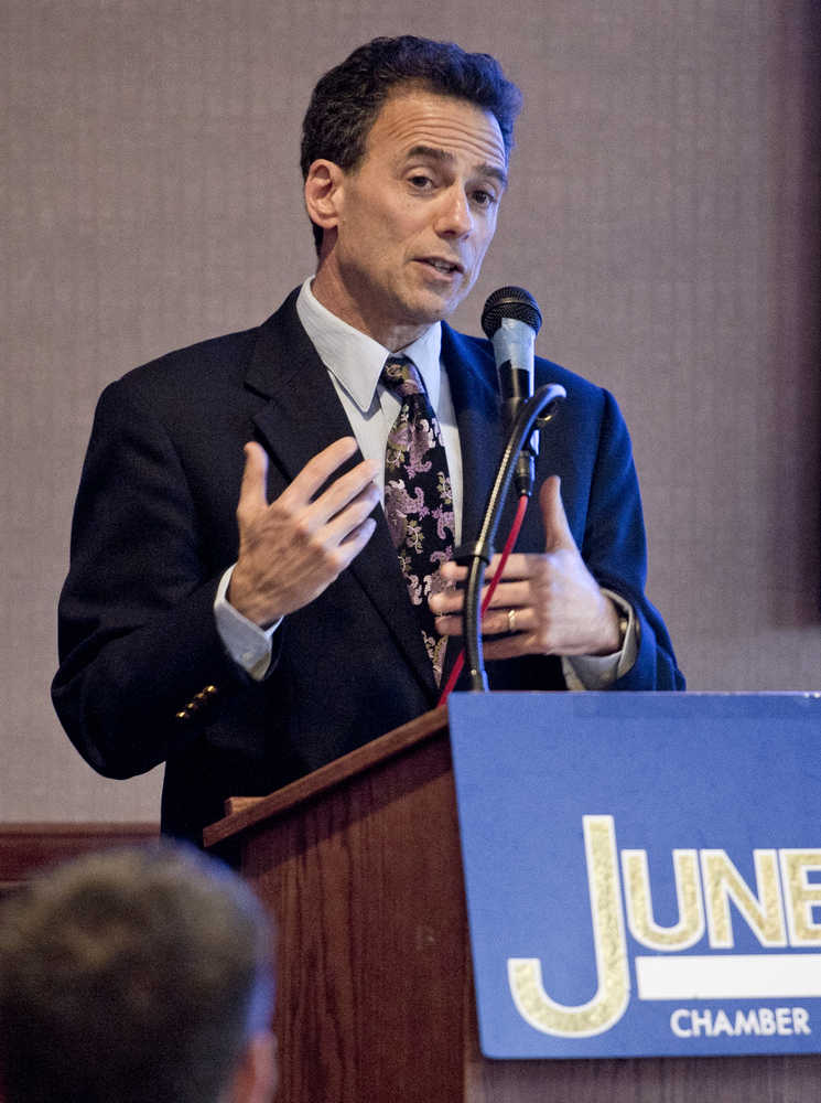 Juneau District Court Judge Keith Levy speaks to the Juneau Chamber of Commerce about recidivism rates in Alaska's judicial system at the Hanger Ballroom on Thursday. Attorney Ben Brown and Sen. John Coghill, R-Fairbanks, also spoke during the Chamber's weekly luncheon.