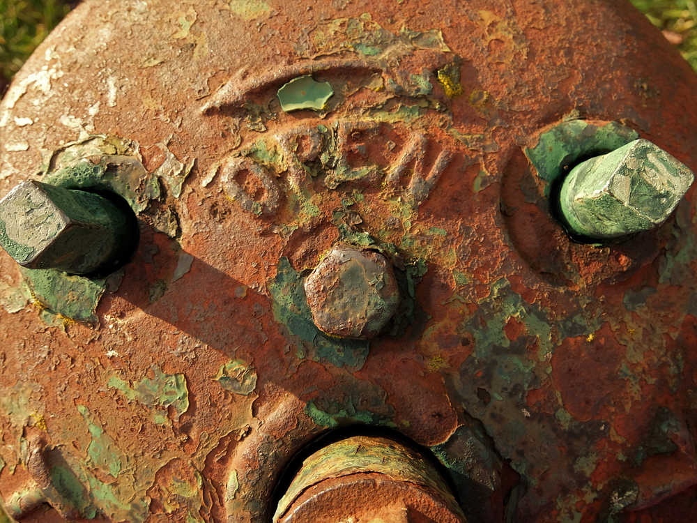 Open face shows a rusty fire hydrant.