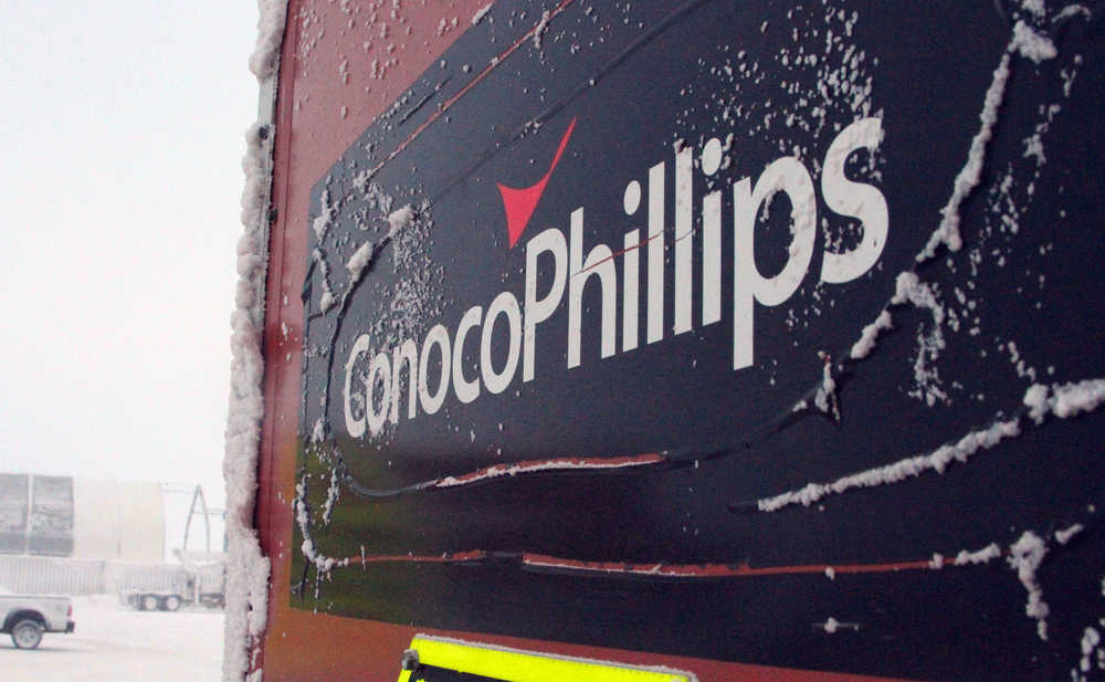 This Feb. 9 photo shows an ice covered ConocoPhillips sign at the Colville-Delta 5, or CD5, drilling site on Alaska's North Slope.