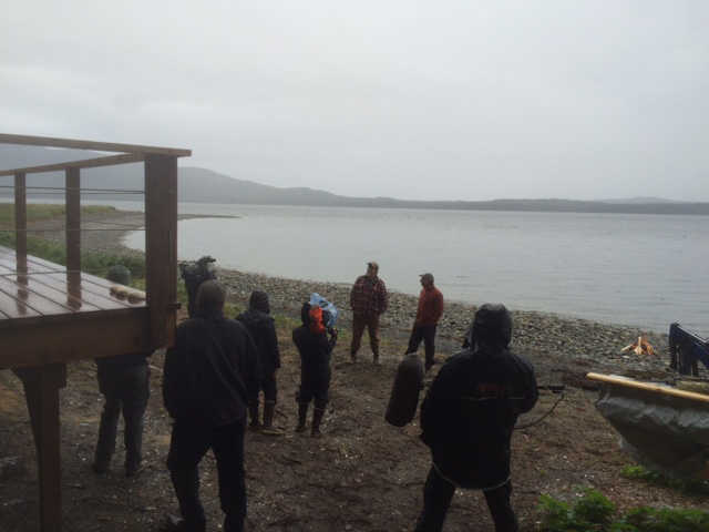 On the beach of Shelter Island before the cabin, David Bartlett can be seen in plaid beside Hans Moser in the orange jacket. Film crew in foreground with camera and mircrophone. Photo taken last day of filming in September 2015.