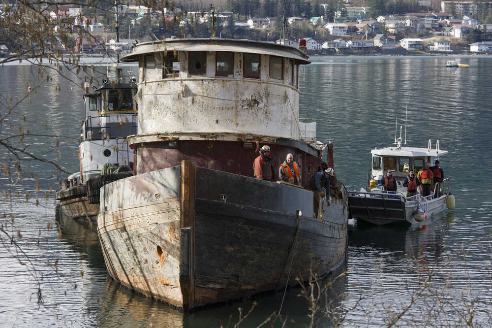 The 96-foot tugboat Challenger is grounded south of downtown to start the demolition process on Monday.