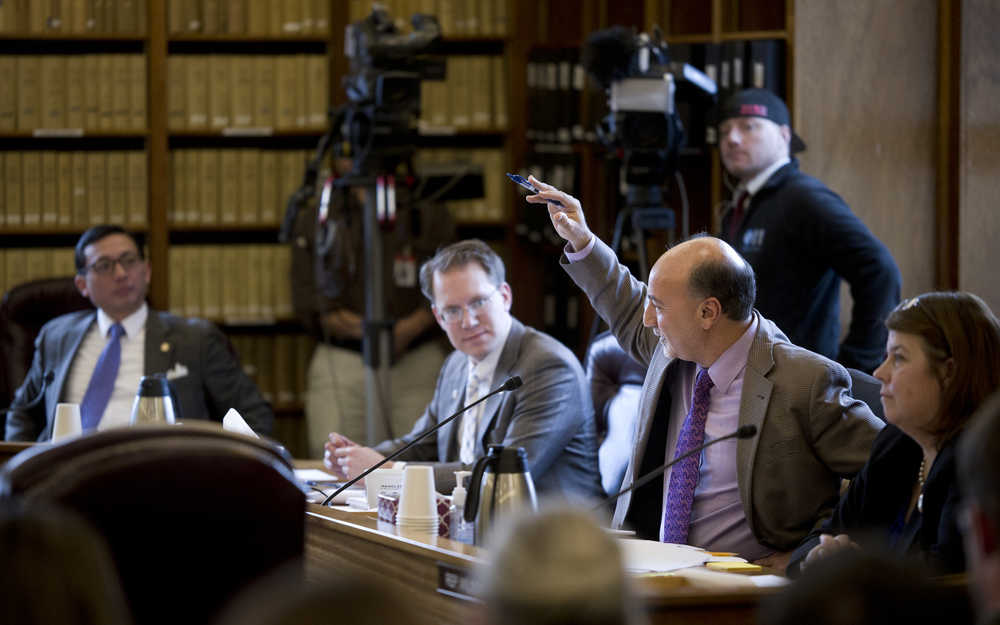 Rep. Les Gara, D-Anchorage, speaks during Tuesday's House Finance Committee meeting on the state operating bill at the Capitol on Tuesday. Listening to Rep. Gara are Rep. Scott Kawasaki, D-Fairbanks, left, Rep. Lance Pruitt, R-Anchorage, and Rep. Tammie Wilson, R-North Pole.