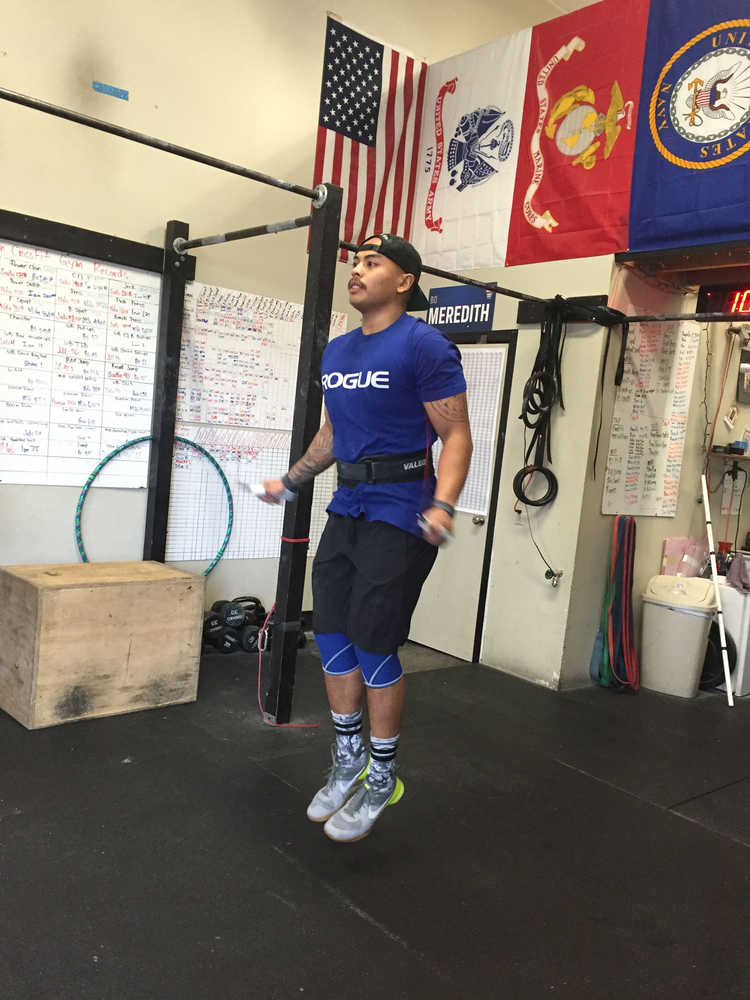 Kevin Manabat completes 50 double unders, the second of three exercises that had to be done within four minutes to move on to the next round. Complete the exercises in the given time and you've earned another round of misery.