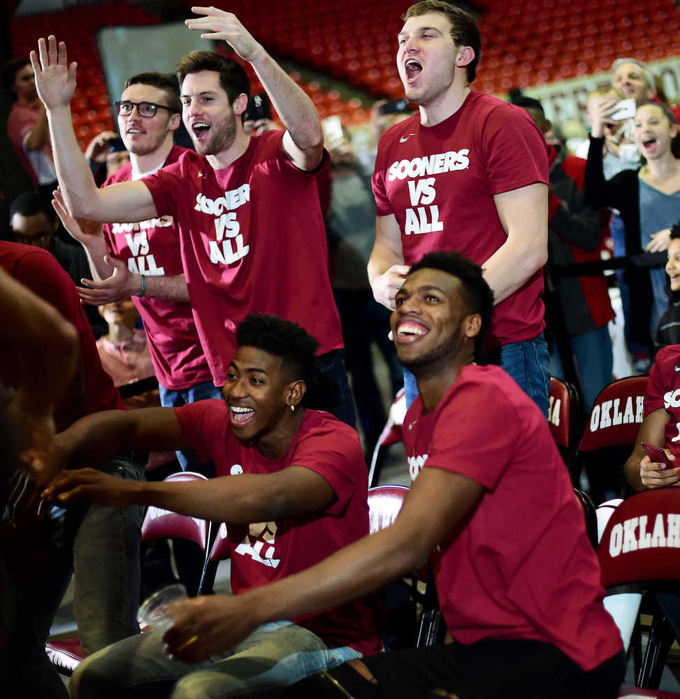 Ryan Spangler, back left, Austin Mankin, back center, C.J. Cole, back right, Christian James, front left, and Buddy Hield, front right, celebrate during the NCAA tournament selection show in Norman, Okla., Sunday, March 13, 2016. No. 2-seed Oklahoma will face No. 15-seed Cal-State Bakersfield in Oklahoma City on Friday. (Tyler DrabekThe Oklahoman via AP) MANDATORY CREDIT