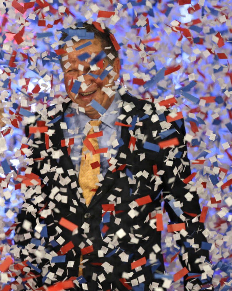 Republican presidential candidate Ohio Gov. John Kasich smiles as confetti is released after speaking at his presidential primary election night rally in Berea, Ohio, on Tuesday.