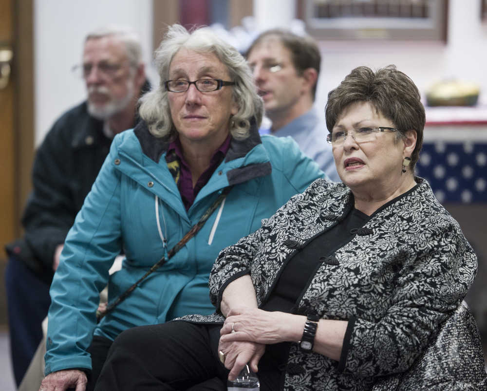Karen Crane, right, watches early election results come in with Assembly members Kate Troll, Jesse Kiehl and Loren Jones at Assembly Chambers on Tuesday.