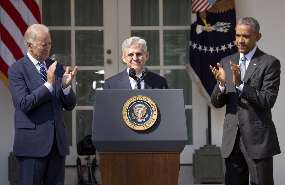 Federal appeals court judge Merrick Garland receives applauds from President Barack Obama and Vice President Joe Biden as he is introduced as Obama's nominee for the Supreme Court during an announcement in the Rose Garden of the White House on Wednesday. Garland, 63, is the chief judge for the United States Court of Appeals for the District of Columbia Circuit, a court whose influence over federal policy and national security matters has made it a proving ground for potential Supreme Court justices.