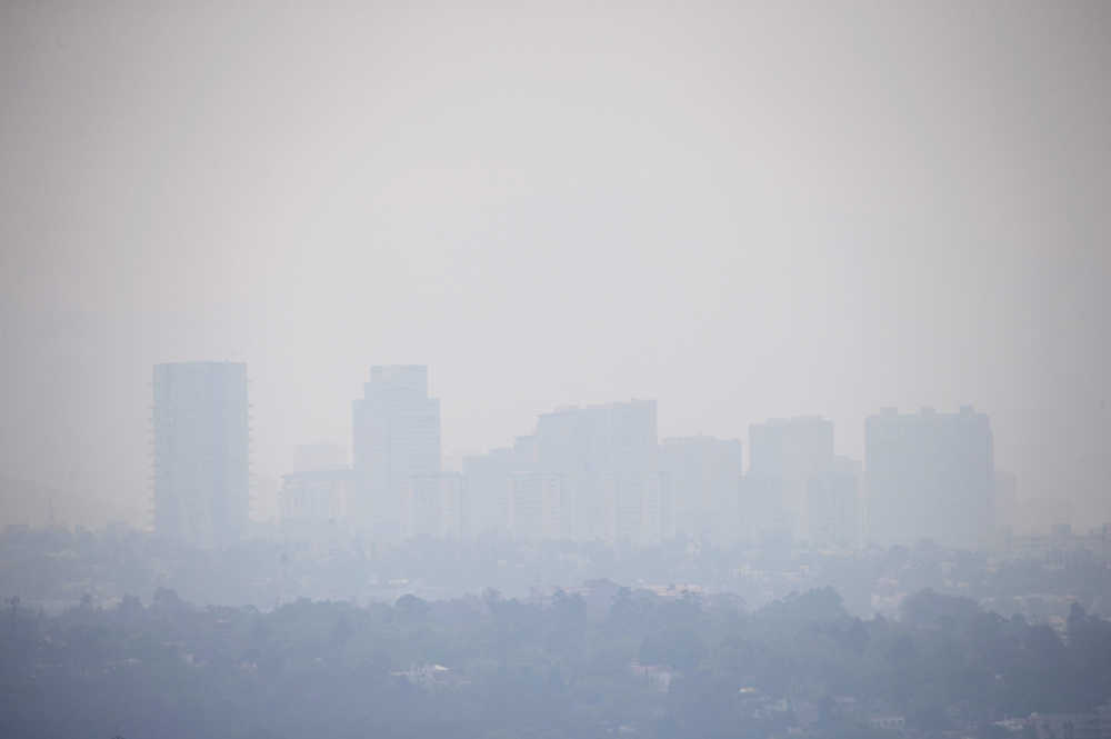 Haze hangs over Mexico City on Wednesday.