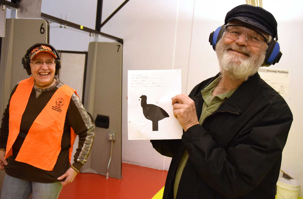 Rep. Paul Seaton, R-Homer, holds up his turkey target during the pistol challenge portion of the 2016 Legislative Shoot, hosted by the Alaska Correctional Officers Association on Saturday at the Juneau Gun Club, Juneau Archery Club and the hunter training center on Montana Creek Road.