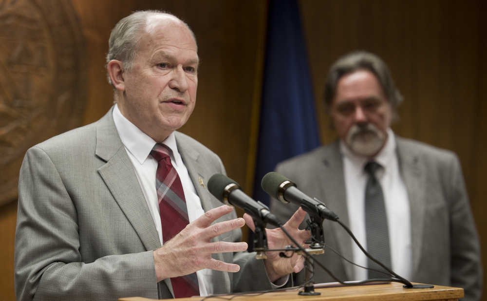 Gov. Bill Walker and Department of Revenue Commissioner Randall Hoffbeck, right, give their Spring Revenue Forecast during a press conference at the Capitol on Monday.