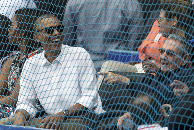 Cuban President Raul Castro, right, and U.S. President Barack Obama attend a baseball match between the Tampa Bay Rays and the Cuban national baseball team in Havana on Tuesday.