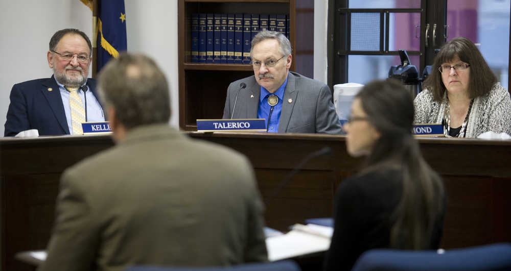 House Education Committee members Rep. Wes Keller, R-Wasilla, left, Rep David Talerico, R-Healy, center, and Rep. Harriet Drummond, D-Anchorage, listen to Sen. Mike Dunleavy, R-Wasilla, and his staff member, Christa McDonald, speak about Sen. Dunleavy's bill, SB 89, at the Capitol on Wednesday.