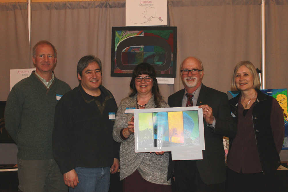The first annual Alaska's Heart through Student Art & Technology Exhibit and Alaska Council of School Administrators' Legislative Reception was recently held in Juneau.  It was an opportunity to have key education stakeholders, legislators and legislative staff meet together and highlight the positive happenings in education.  Superintendent Mark Miller attended the event and is with artwork by students in the Juneau Borough School District.  Student artists received certificates signed by the honorary chair of the event, First Lady Donna Walker. Many pieces from the exhibit are now on display in the Capitol for all to enjoy. The evening was sponsored by the Alaska Council of school Administrators, GCI Education, Juneau Arts & Humanities Council and the Alaska Arts Education Consortium.