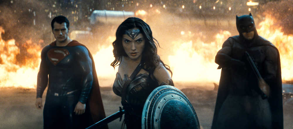 This image released by Warner Bros. Entertainment shows Henry Cavill as Superman, left, Gal Gadot as Wonder Woman and Ben Affleck as Batman in a scene from "Batman v Superman: Dawn of Justice."