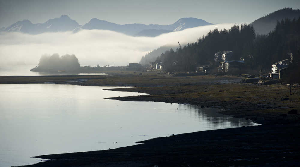 The sunrise mixes with fog along the Douglas waterfront on Thursday.