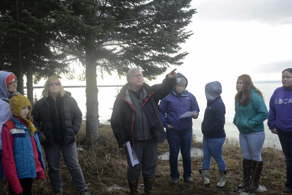 Alan Boraas, a profossor of Anthropology at Kenai Peninsula College, orients a group of Kenaitze Indian Tribe members, students and other college faculty at Kalifornsky Village on March 24.