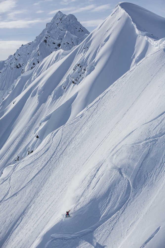 Ryland Bell of Elfin Cove and Juneau snowboards in Haines during the Freeride World Tour. Bell was first among snowboarders in the event. Photo by Jeremy Bernard.