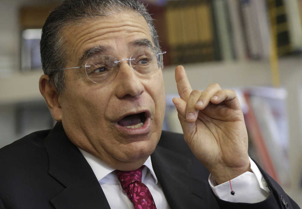 Partner of the Panama-based law firm Mossack Fonseca, Ramon Fonseca speaks during an interview at his office in Panama City, Thursday, April 7, 2016. Fonseca, a co-founder of Mossack Fonseca, one of the world's largest creators of shell companies, said that documents investigated by the ICIJ were authentic and had been obtained illegally by hackers. (AP Photo/Arnulfo Franco)