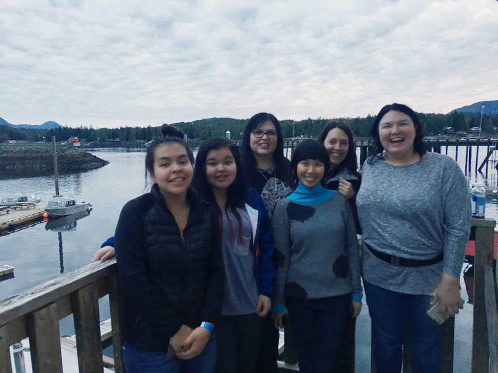 Members of the Tidelines Ferry Tour from left  to right:  Hoonah high schoolers Cecilia George and Mary Jack,  artists Heather Powell, Michelle Kuen Suet Fung, Chantal Bilodeau, Allison Warden at the ferry terminal in Ketchikan.