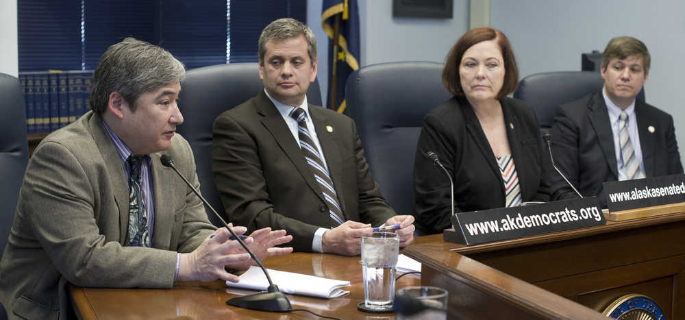 Rep. Sam Kito, D-Juneau, left, speaks during a press conference held by minority caucas leaders at the Capitol on Tuesday. Attending are House Minority Leader Rep. Chris Tuck, D-Anchorage, second from left, Senate Minority Leader Sen. Berta Gardner, D-Anchorage, and Sen. Bill Wielechowski, D-Anchorage, right.