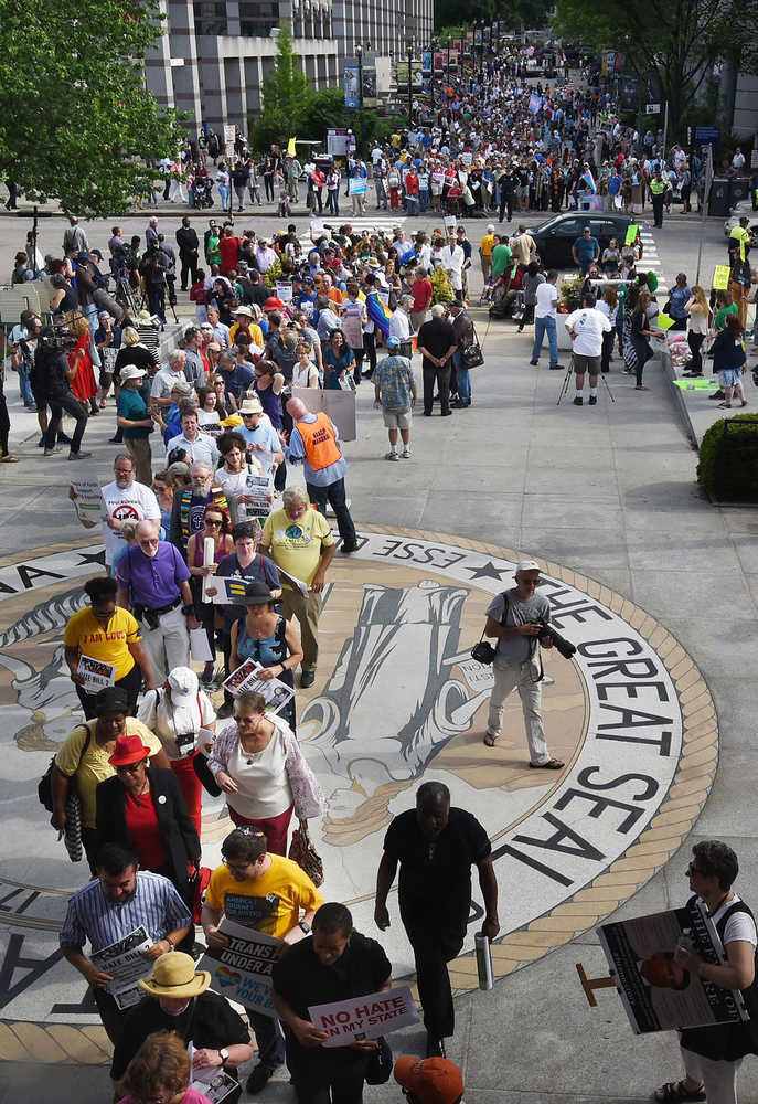 Protesters head into the Legislative building for a sit-in Monday against House Bill 2 in Raleigh, North Carolina.
