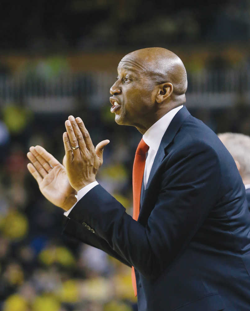 In this Feb. 22, 2015 photo, Ohio State assistant coach Dave Dickerson yells from the bench during a NCAA basketball game against Michigan in Ann Arbor, Michigan.