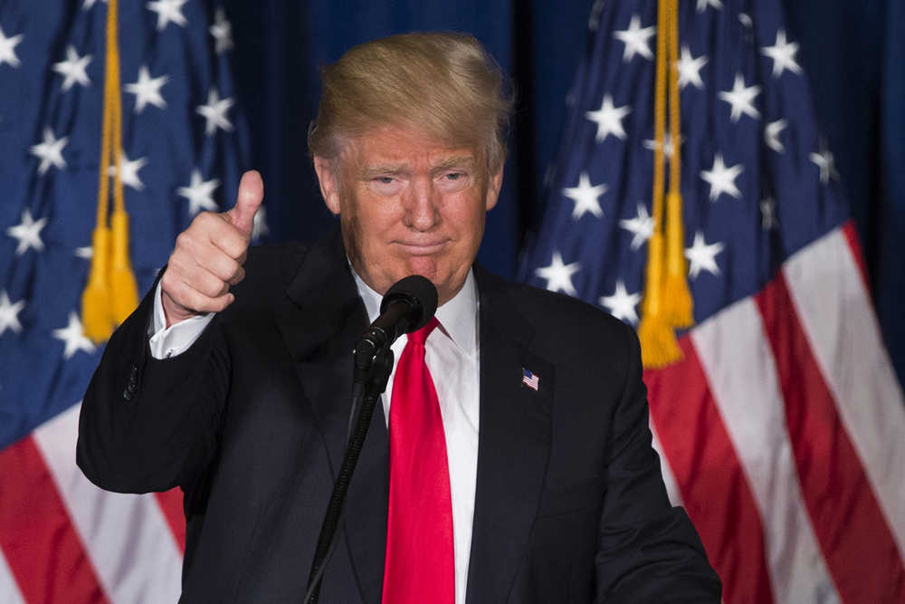 Republican presidential candidate Donald Trump gives a thumbs up after giving a foreign policy speech at the Mayflower Hotel in Washington, Wednesday, April 27, 2016. Trump's highly anticipated foreign policy speech Wednesday will test whether the Republican presidential front-runner, known for his raucous rallies and eyebrow-raising statements, can present a more presidential persona as he works to unite the GOP establishment behind him. (AP Photo/Evan Vucci)