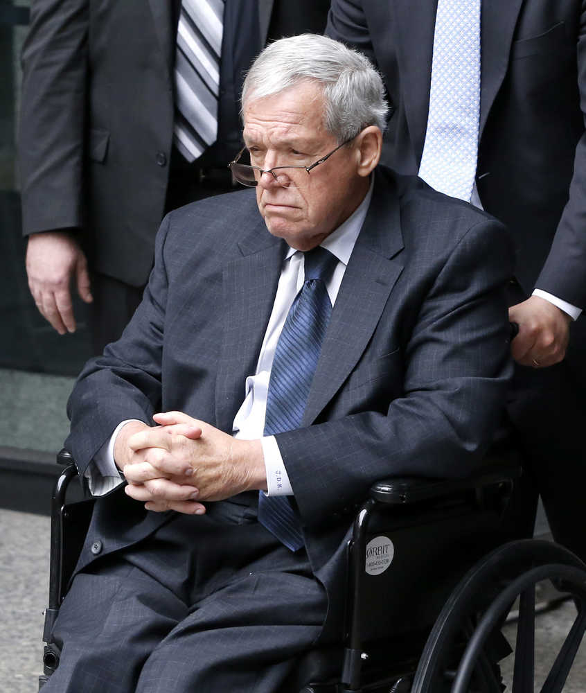 Former House Speaker Dennis Hastert departs the federal courthouse Wednesday, April 27, 2016, in Chicago, after his sentencing on federal banking charges which he pled guilty to last year. Hastert was sentenced to more than a year in prison in the hush-money case that included accusations he sexually abused teenagers while coaching high school wrestling. (AP Photo/Charles Rex Arbogast)