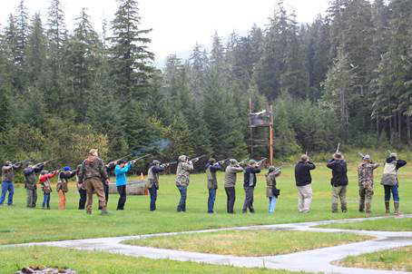 Juneau Trap Club Shooters conducting a ceremonial hat shoot for Craig Salzillo.