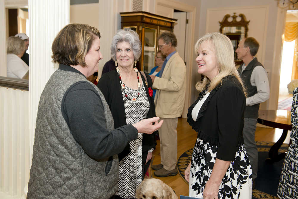Michele Stuart Morgan, left, chats with First Lady Donna Walker, right, before the First Lady's Volunteer of the Year award ceremony Wednesday at the Governor's Mansion. Morgan is one of 12 Alaskans recognized this year for their service to the state. She is the founder of "Juneau - Stop Heroin, Start Talking."