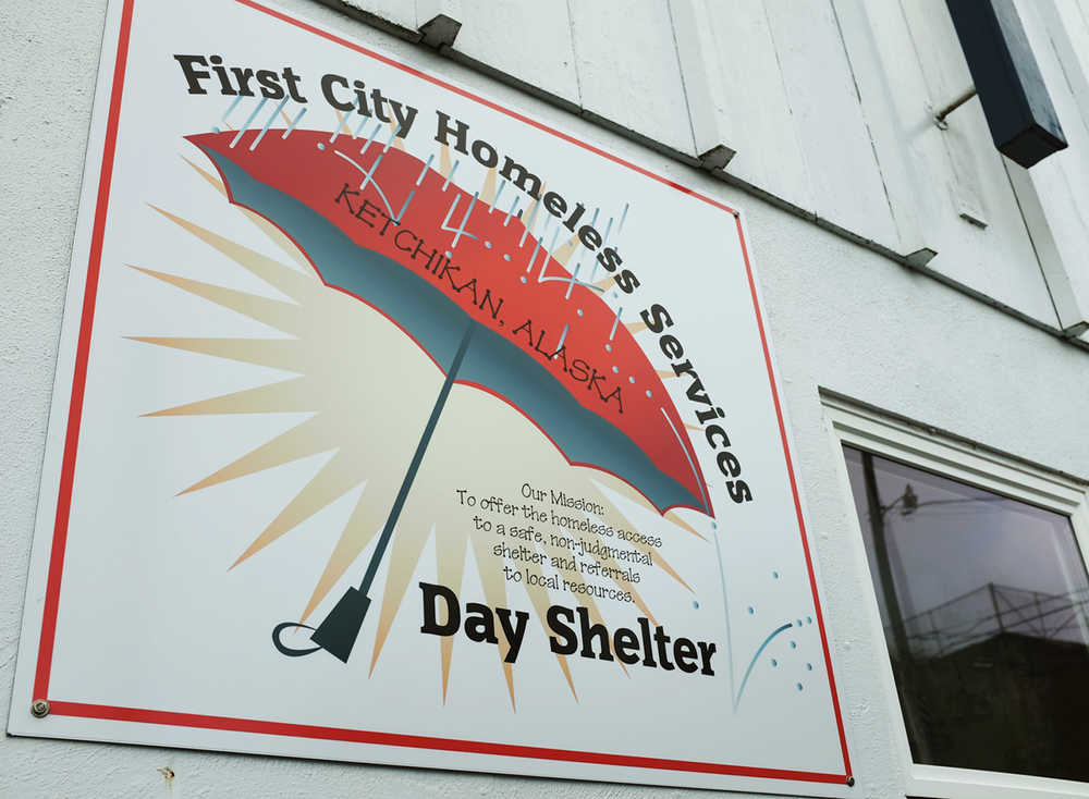This May 3, 2016 photo shows the sign of the First City Homeless Services in Ketchikan, Alaska.  Cruise ship passengers have been hanging out at an Alaska homeless shelter to get free coffee and a bite to eat, but few have bothered making a donation, said one of the nonprofit's board members. (Nick Bowman/Ketchikan Daily News via AP) MANDATORY CREDIT