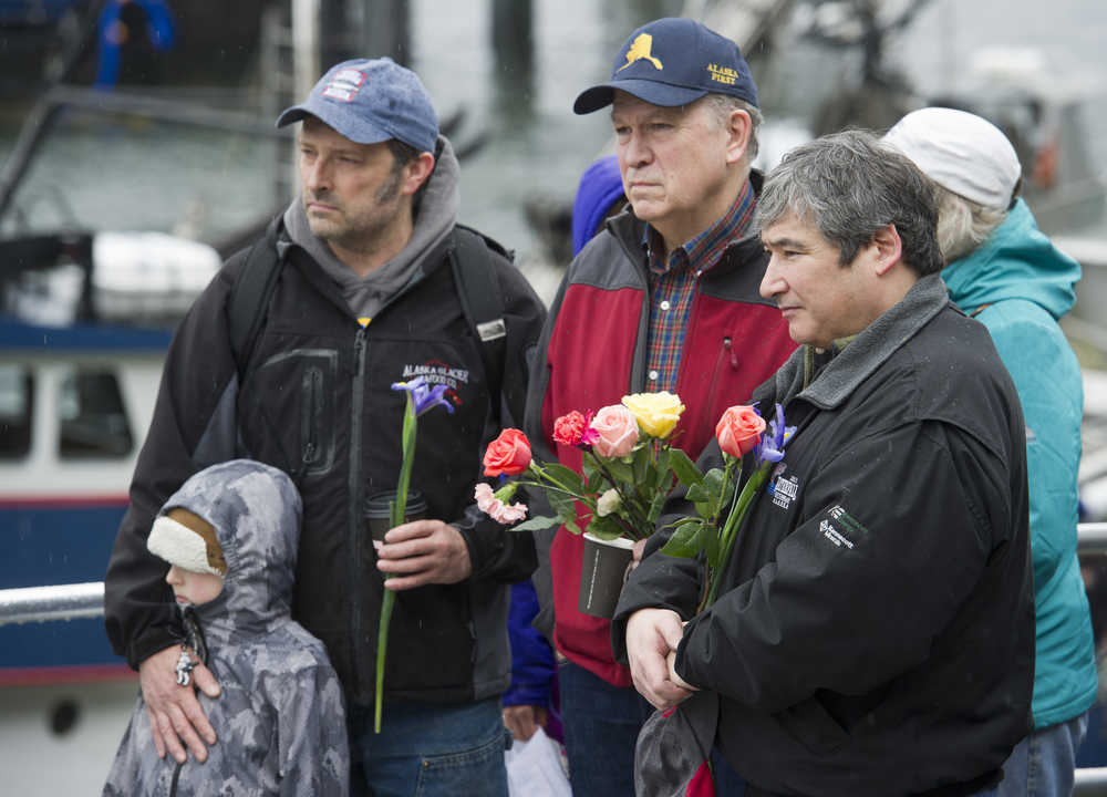 Ian Fisk, left, Gov. Bill Walker, center, and Rep. Sam Kito III attend the Blessing of the Fleet and Dedication of Names at the Alaska Commercial Fishermen's Memorial in Juneau on Saturday, May 7, 2016.