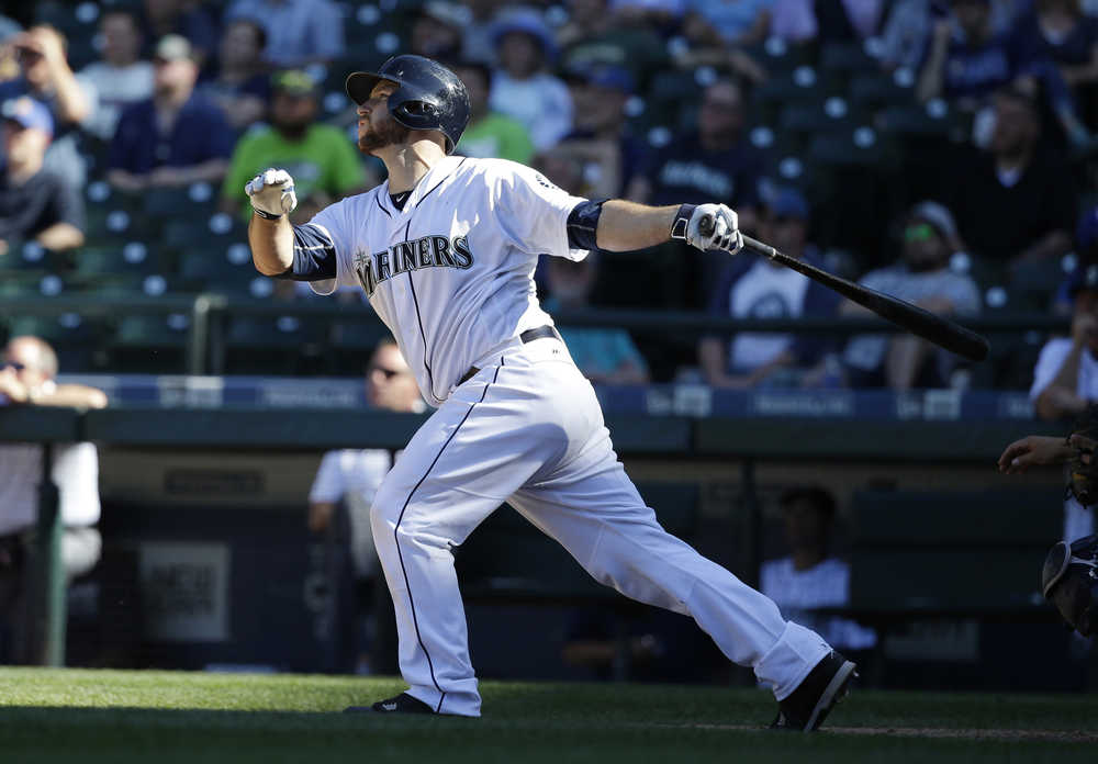 Seattle Mariners' Chris Iannetta watches his walk-off solo home run in the 11th inning of a baseball game against the Tampa Bay Rays, Wednesday, May 11, 2016, in Seattle. The Mariners beat the Rays 6-5. (AP Photo/Ted S. Warren)