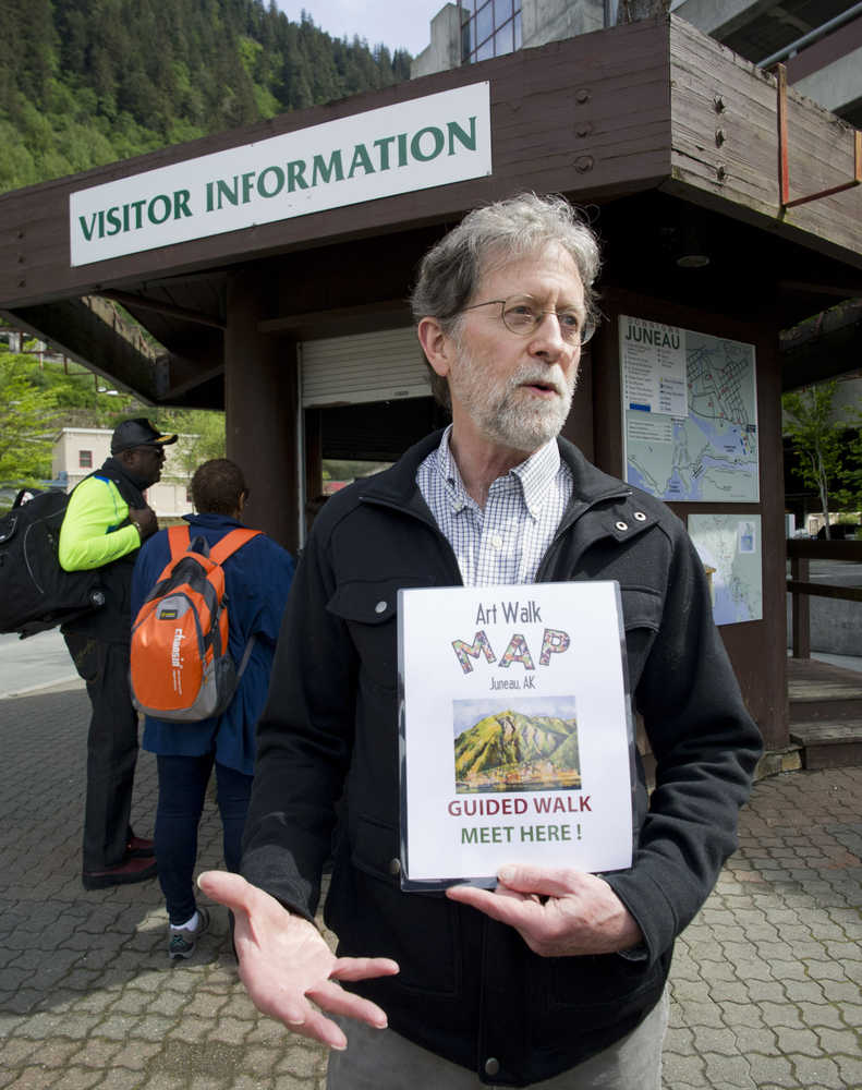 Dan Hopson waits to lead an Art Walk tour in downtown Juneau in May.