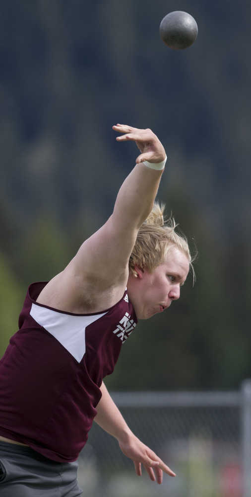 Ketchikan senior Brian McClennan competes in the shot put during the Region V Track and Field Championships at Thunder Mountain High School on Friday.